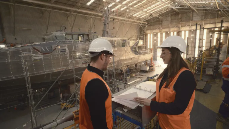 Image of Austal Australia employees working in Henderson shipyard.